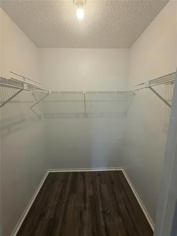 a view of a room with racks on the wall