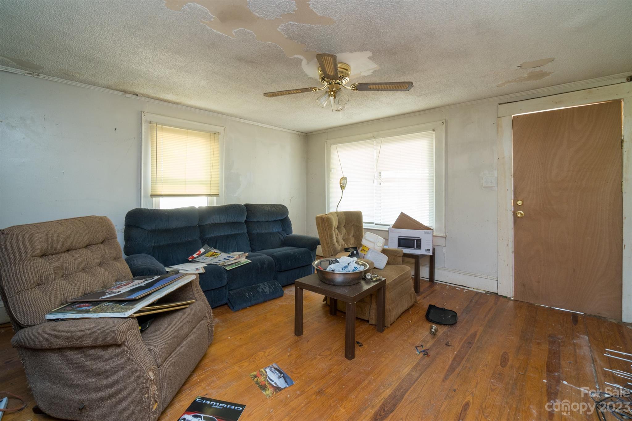 159 Applehill Road Troutman, NC 28166 - Photo 4 of 21 a living room with furniture and a wooden floor