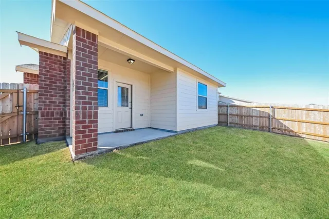 a view of backyard with backyard