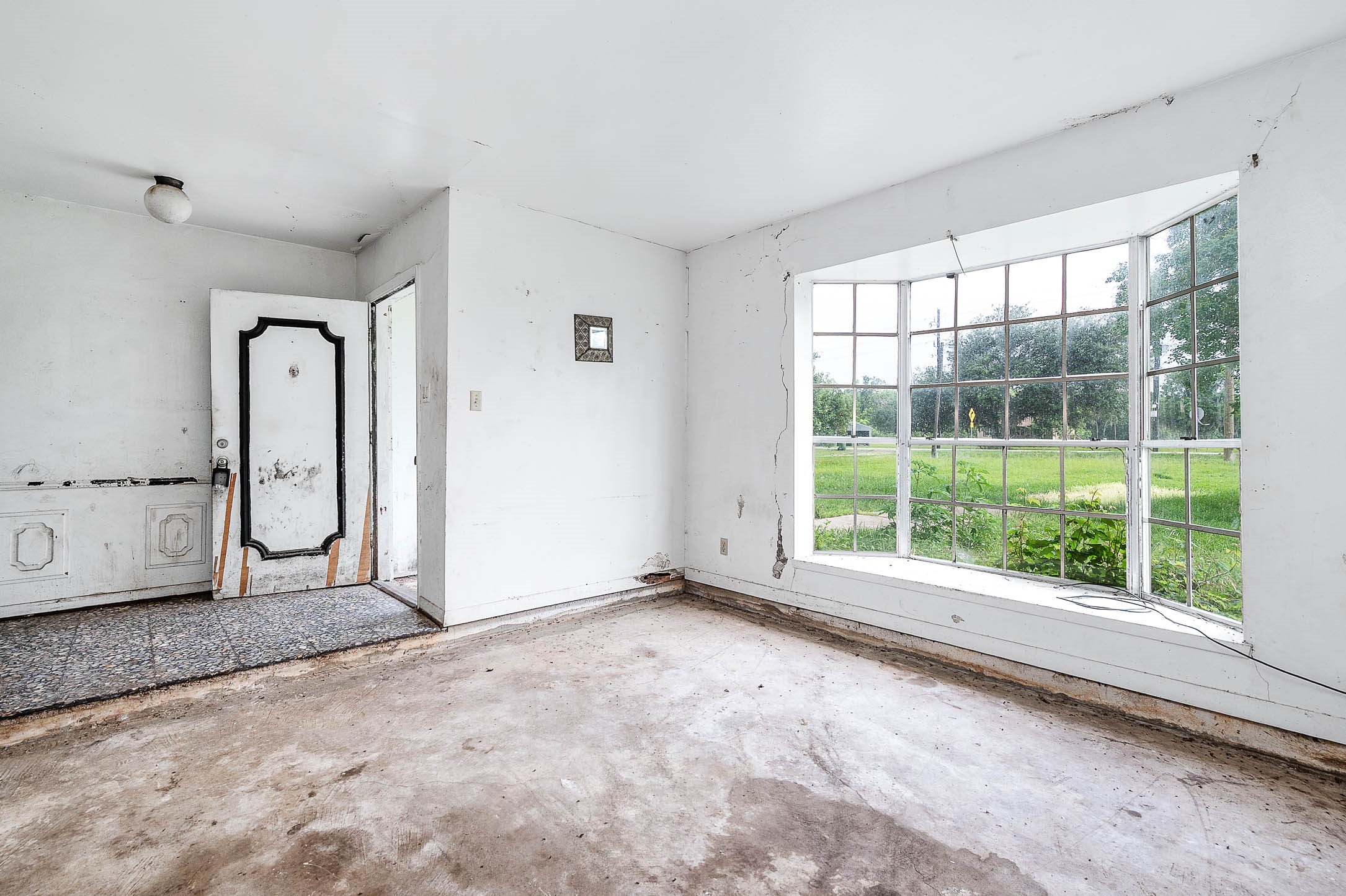 2719 Farm To Market 524 Road Sweeny, TX 77480 - Photo 6 of 20 a view of an empty room with a window