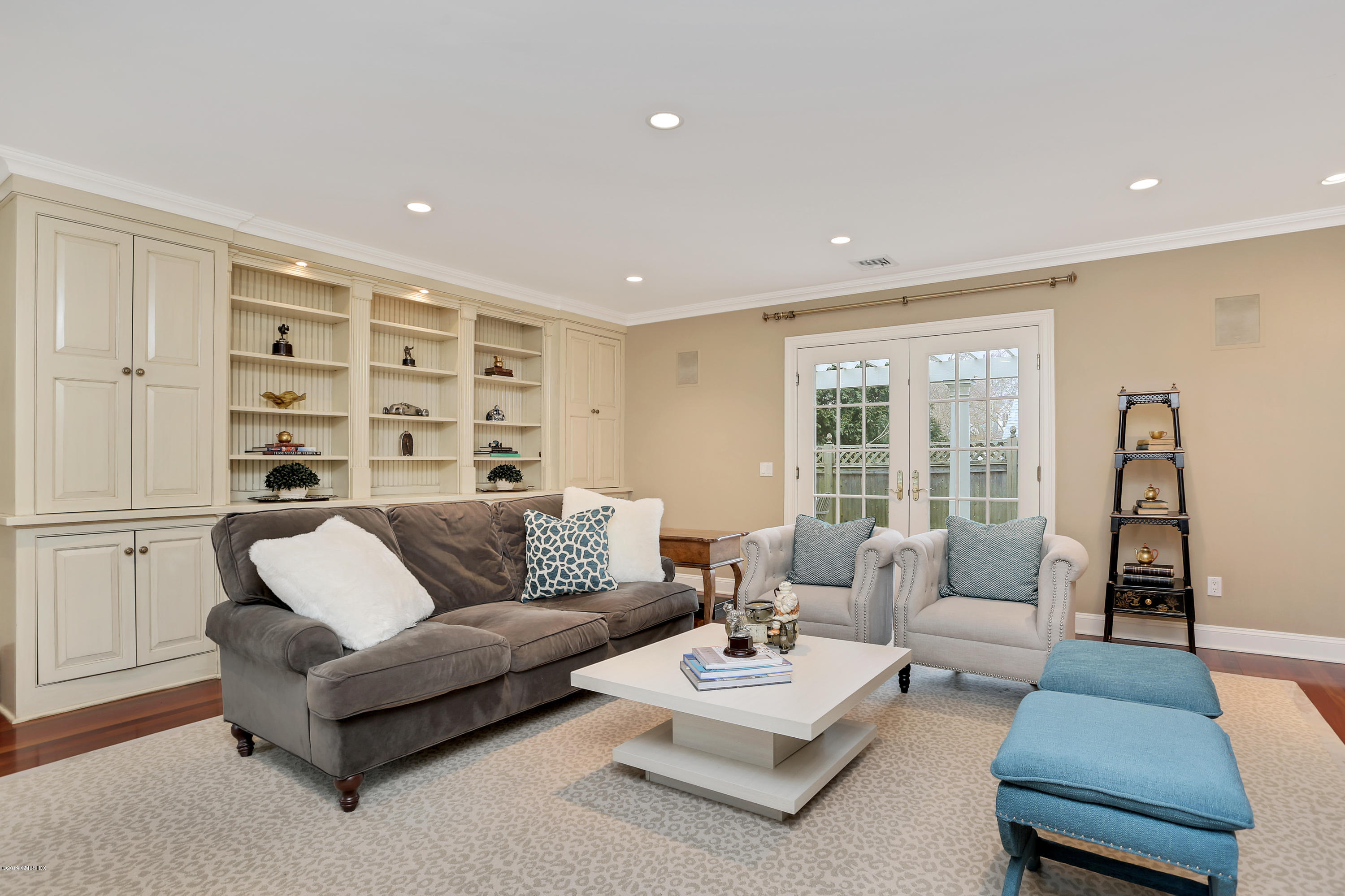 99 Lockwood Road Riverside, CT 06878 - Photo 12 of 21 a living room with furniture and a large window