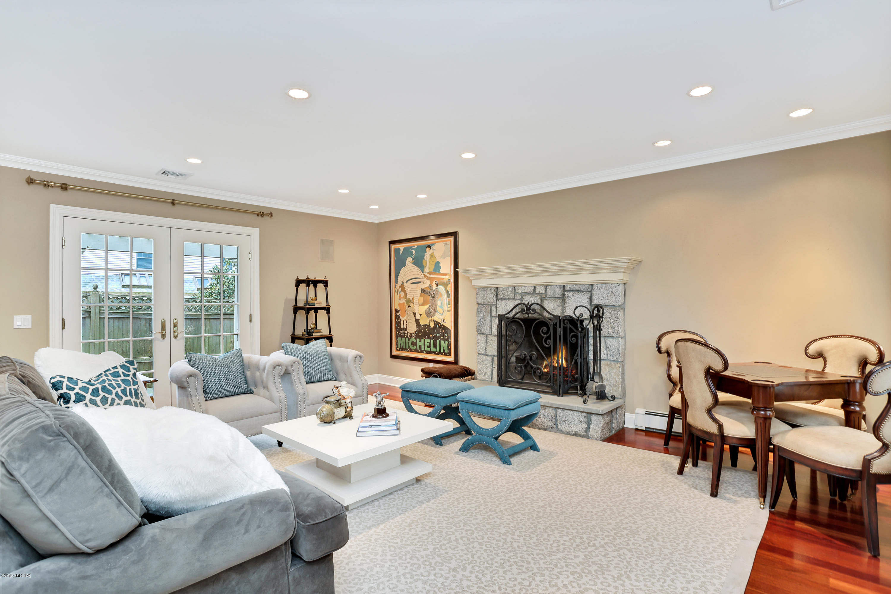 99 Lockwood Road Riverside, CT 06878 - Photo 13 of 21 a living room with furniture and a fireplace