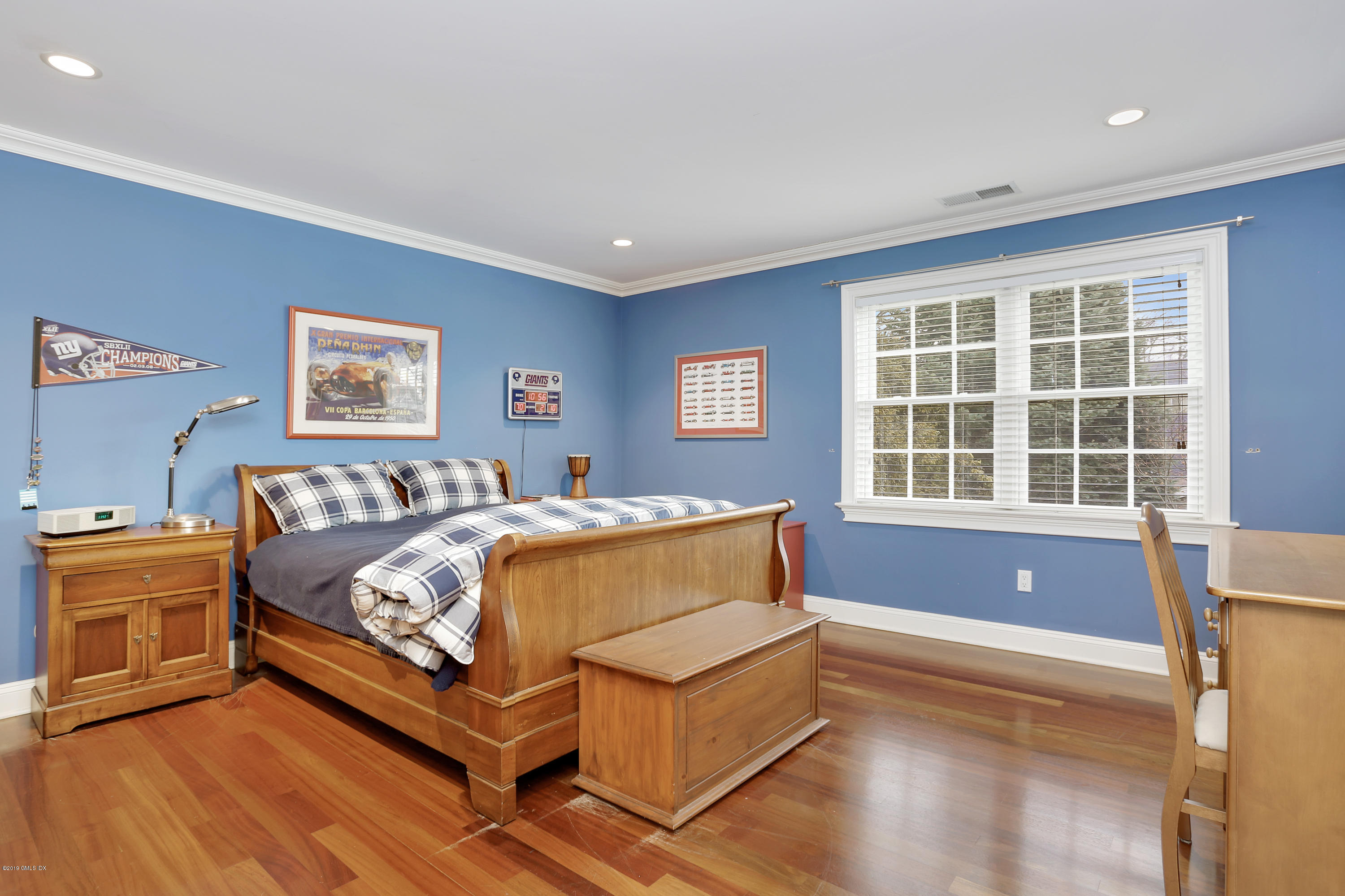 99 Lockwood Road Riverside, CT 06878 - Photo 17 of 21 a bed room with a bed and a couch