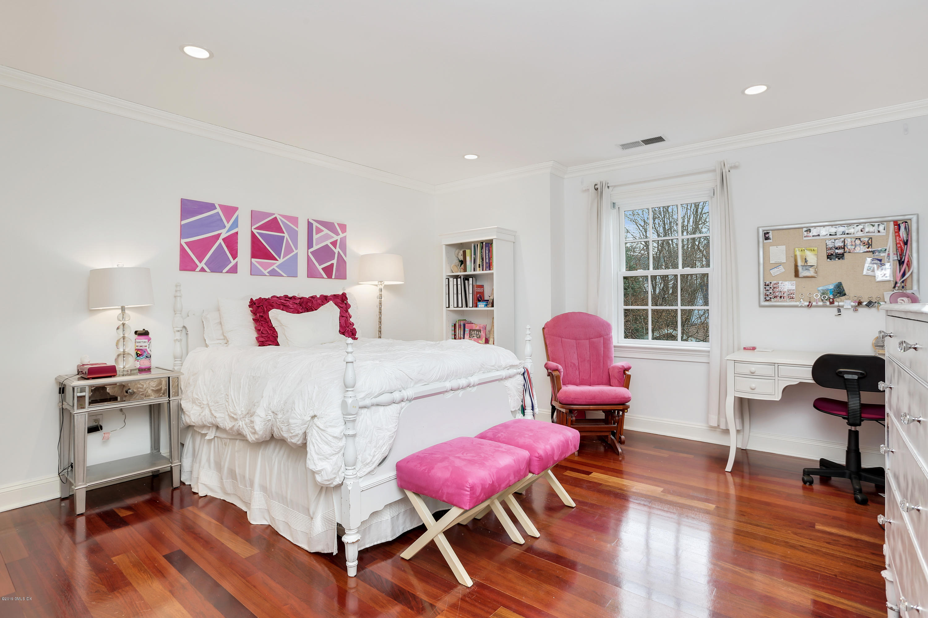 99 Lockwood Road Riverside, CT 06878 - Photo 18 of 21 a bedroom with furniture and wooden floor