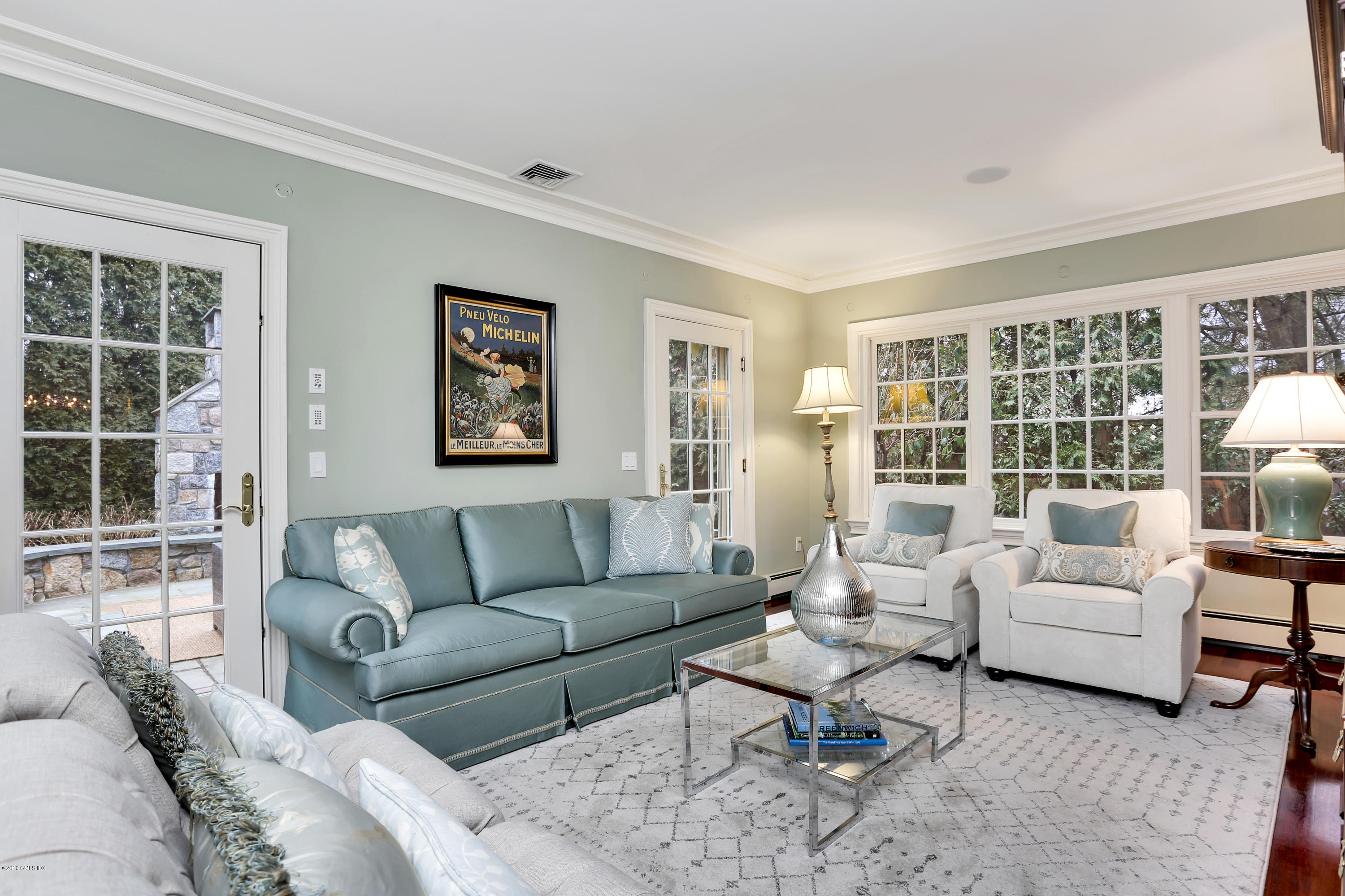 99 Lockwood Road Riverside, CT 06878 - Photo 3 of 21 a living room with furniture and a large window