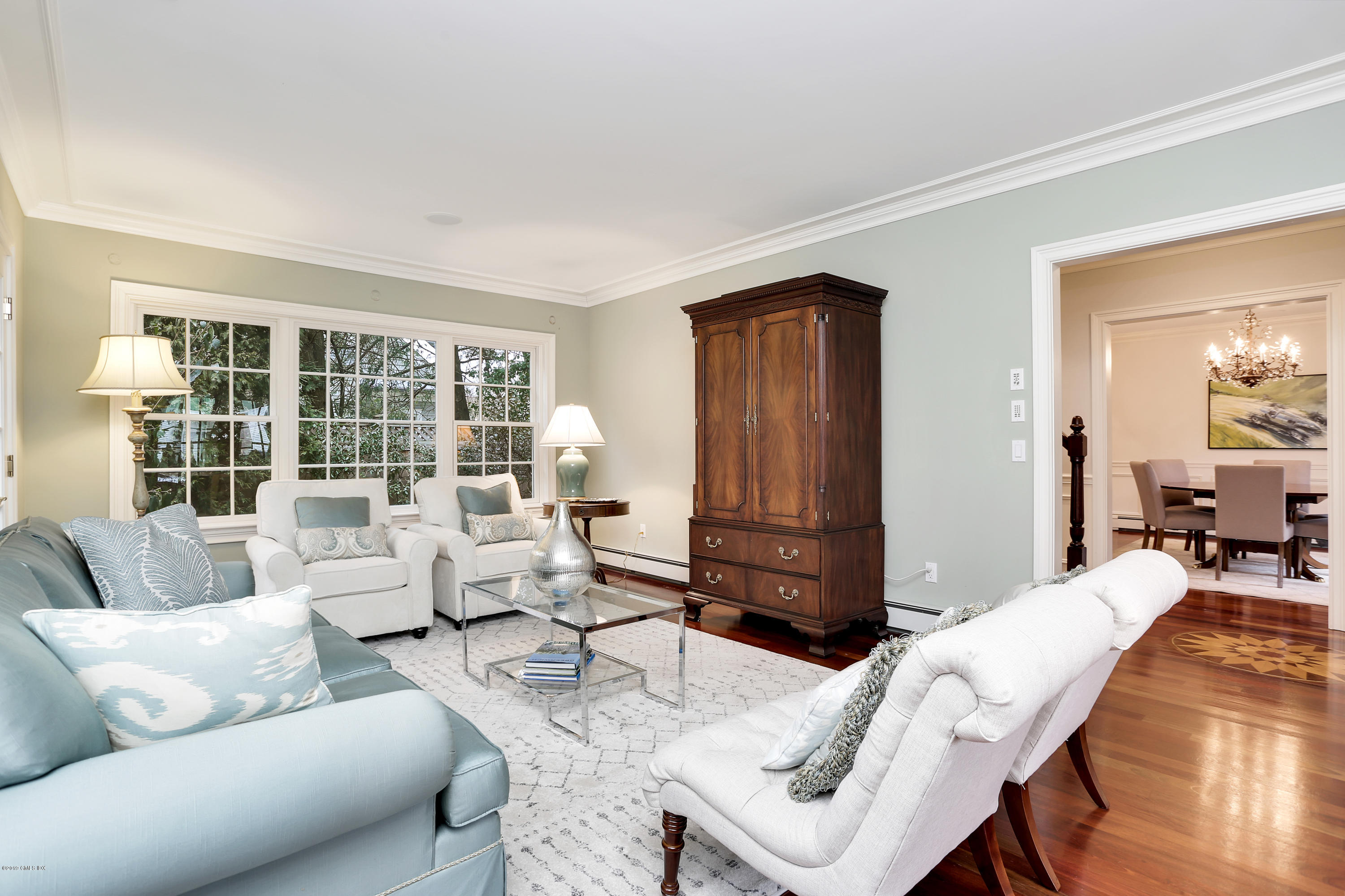99 Lockwood Road Riverside, CT 06878 - Photo 4 of 21 a living room with furniture and a large window