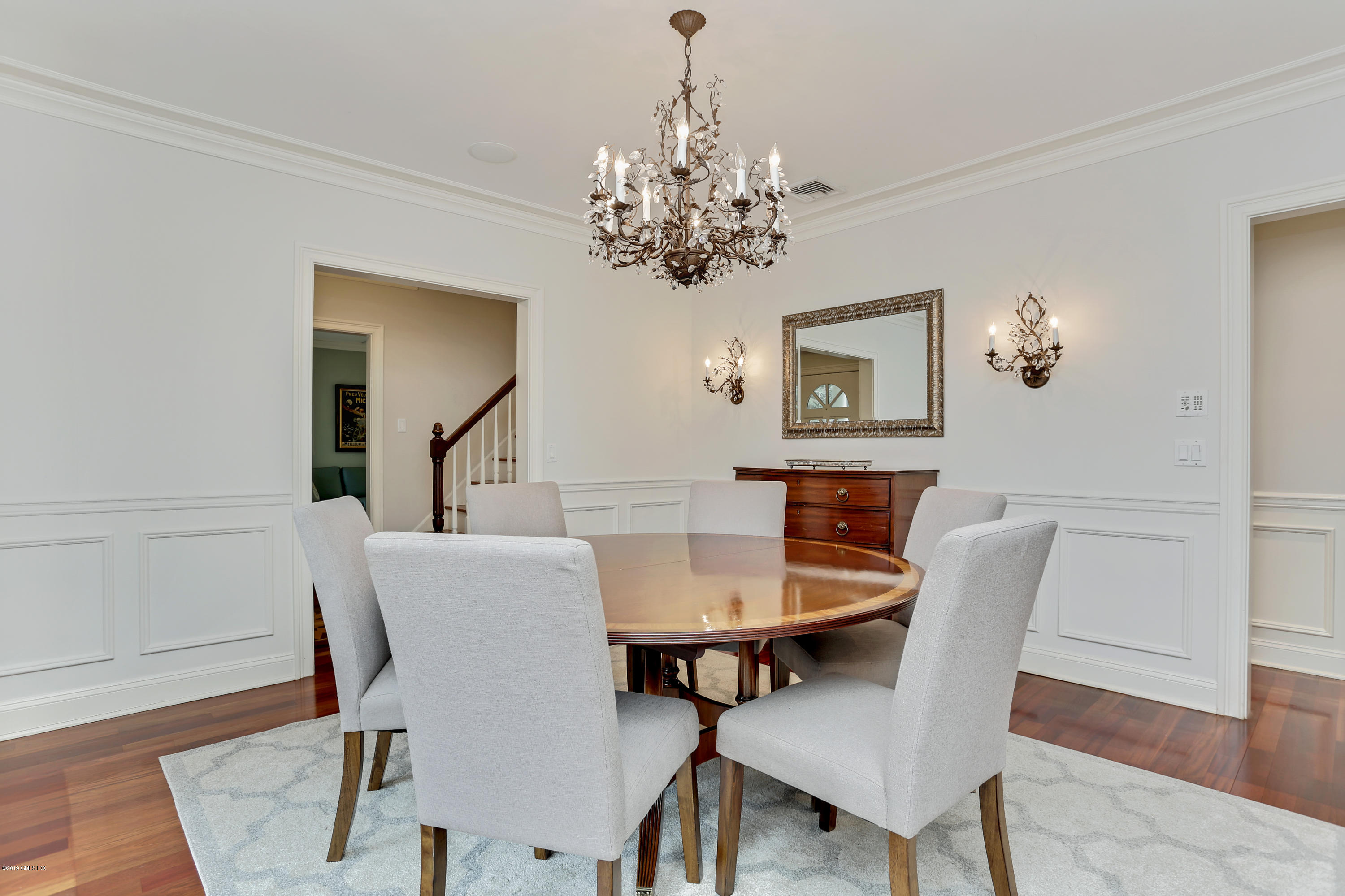 99 Lockwood Road Riverside, CT 06878 - Photo 6 of 21 a view of a dining room with furniture and wooden floor
