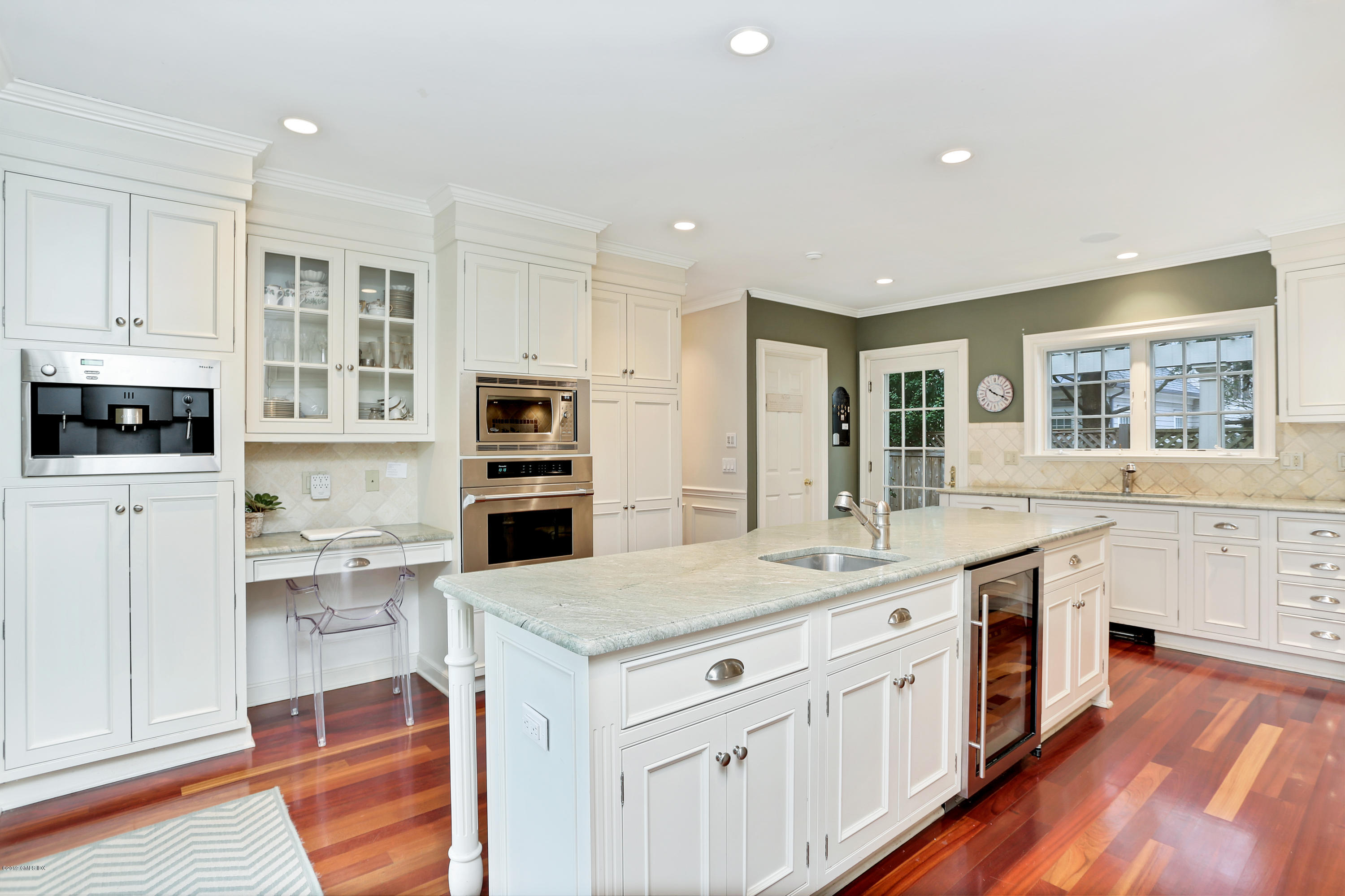 99 Lockwood Road Riverside, CT 06878 - Photo 9 of 21 a kitchen with lot of counter space and wooden floor