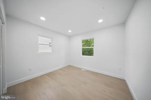 an empty room with windows