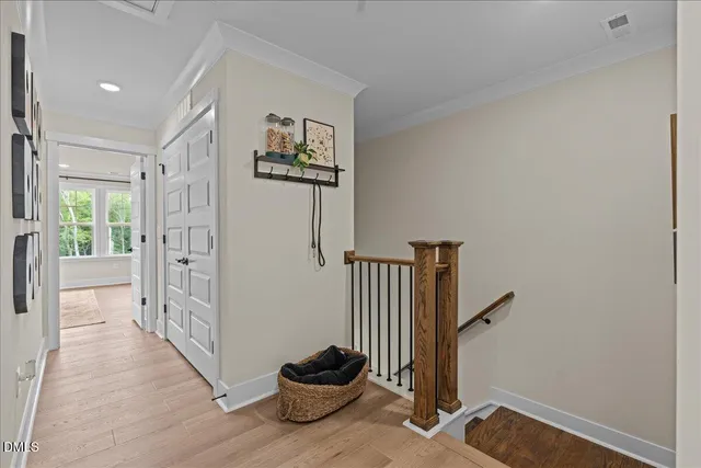 a view of entryway with wooden floor