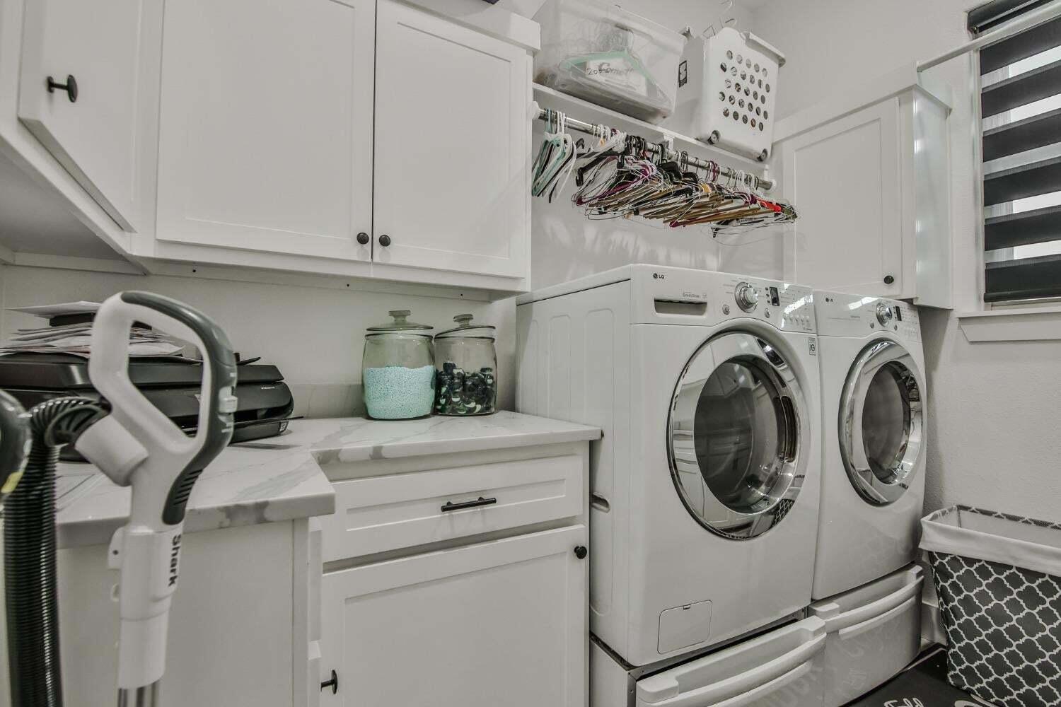 19210 County Road 2240 Lubbock, TX 79423 - Photo 39 of 46 a utility room with dryer and washer