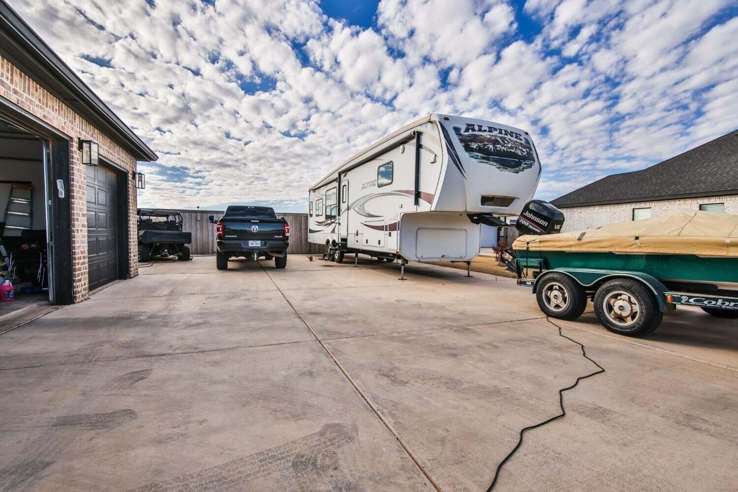 19210 County Road 2240 Lubbock, TX 79423 - Photo 44 of 46 a car parked in front of a building