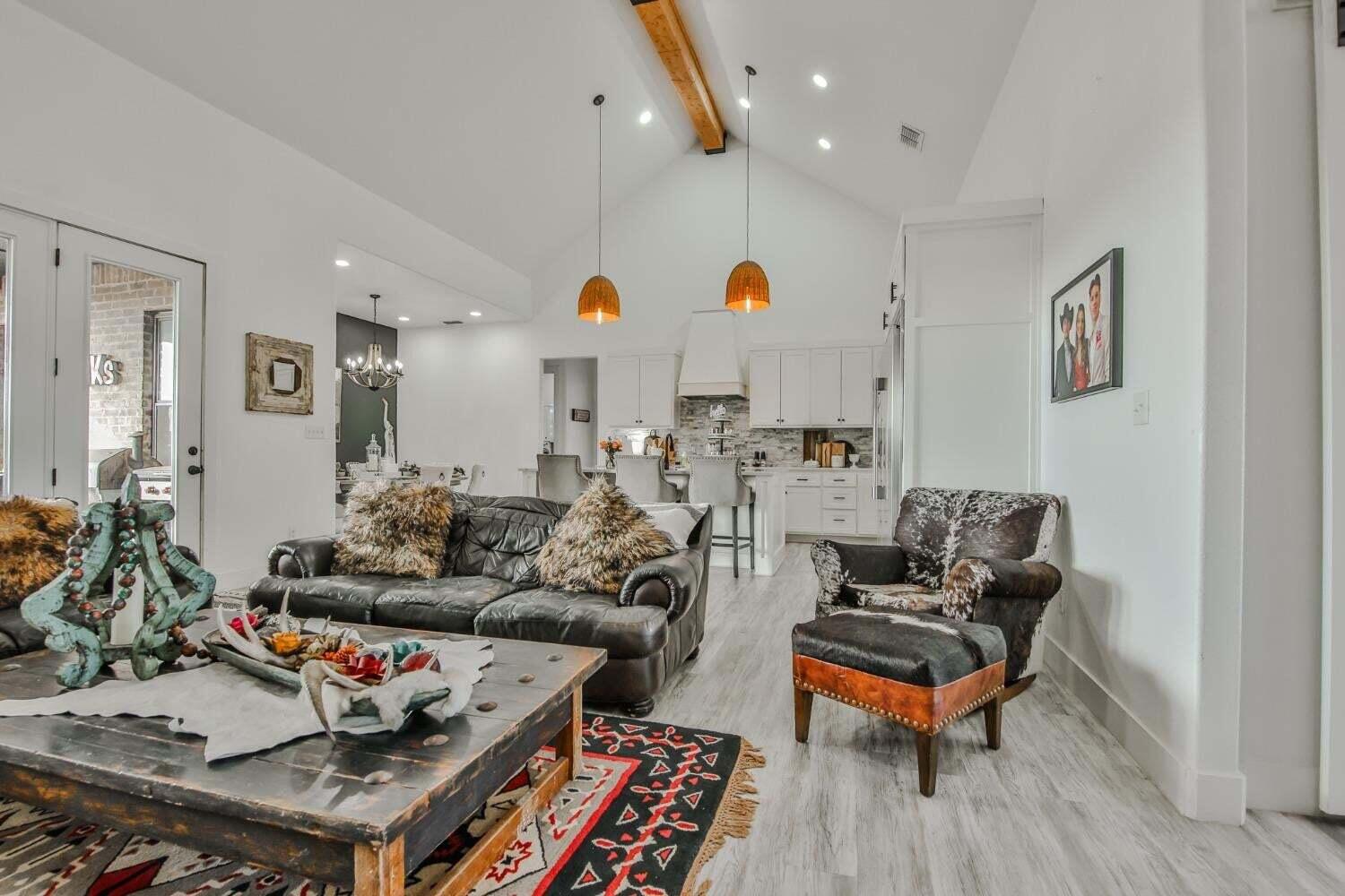 19210 County Road 2240 Lubbock, TX 79423 - Photo 7 of 46 a living room with furniture and wooden floor