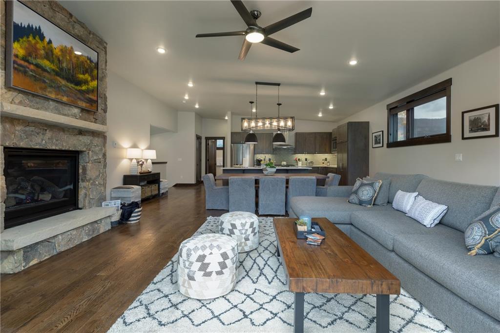137 Moss Way Silverthorne, CO 80498 - Photo 12 of 25 a living room with furniture and a fireplace