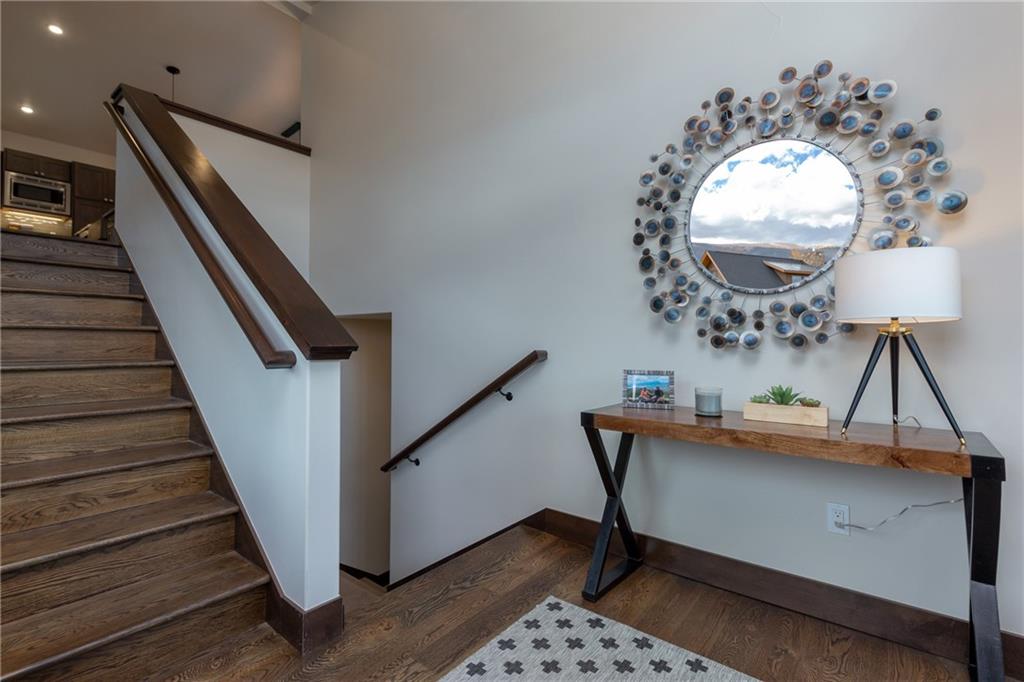 137 Moss Way Silverthorne, CO 80498 - Photo 13 of 25 a view of entryway and hall with wooden floor