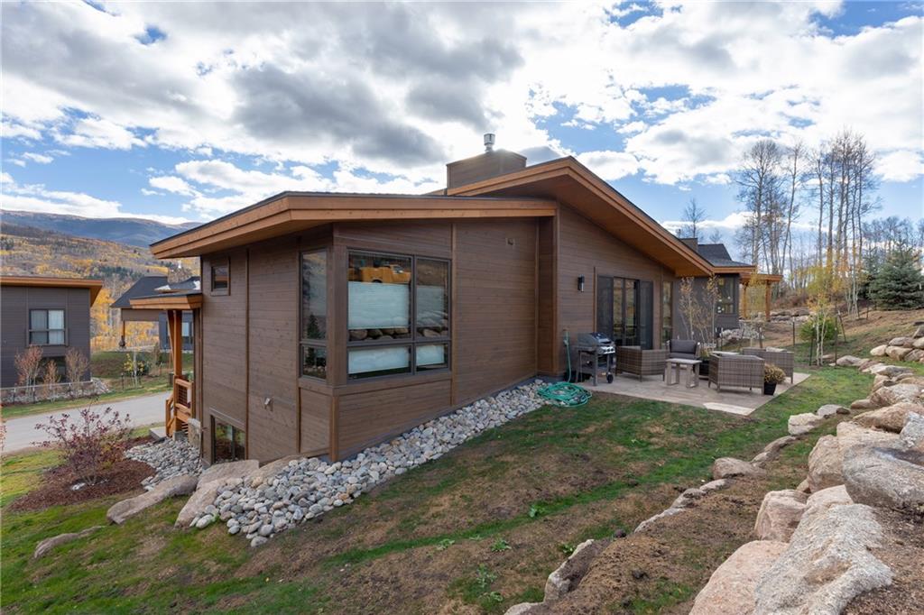 137 Moss Way Silverthorne, CO 80498 - Photo 3 of 25 a view of a house with backyard stove and sitting area
