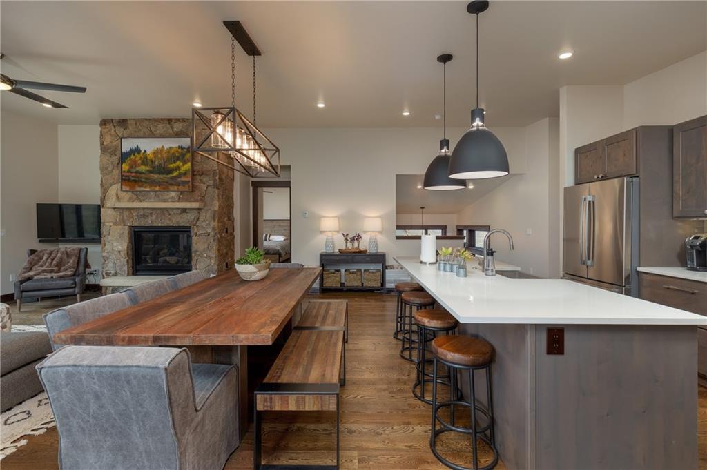 137 Moss Way Silverthorne, CO 80498 - Photo 8 of 25 a dinning room and kitchen with a decorative lights