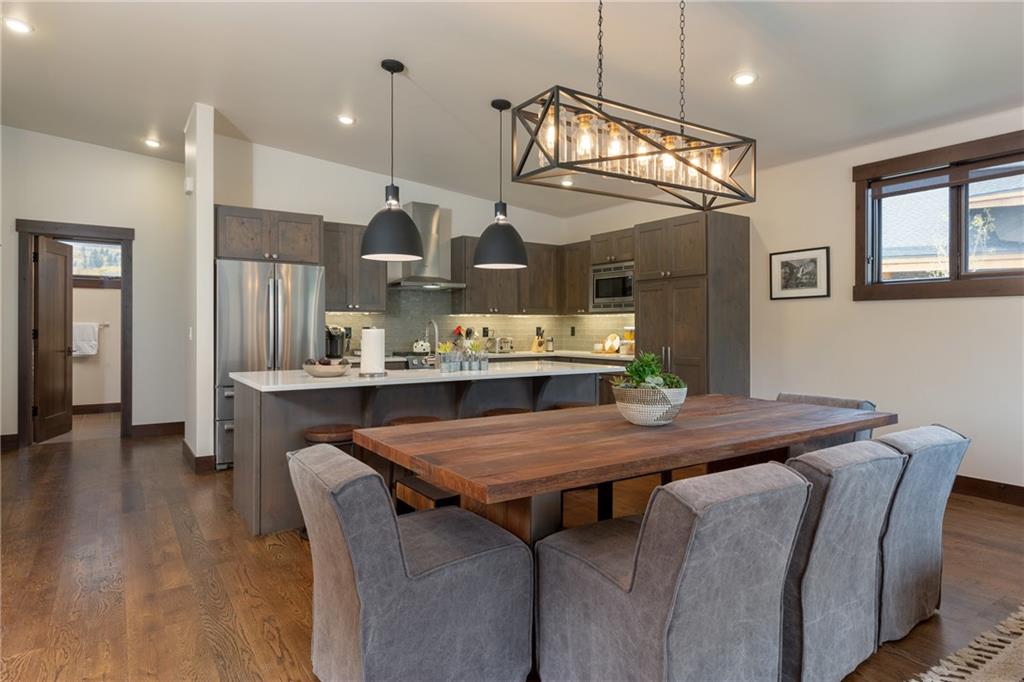 137 Moss Way Silverthorne, CO 80498 - Photo 9 of 25 a view of a dining room with furniture
