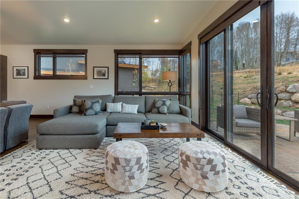 137 Moss Way Silverthorne, CO 80498 - Photo 10 of 25 a living room with furniture and a rug