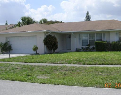 105 Timber Run East Riviera Beach, FL 33407 - Photo 1 of 2 Primary Photo