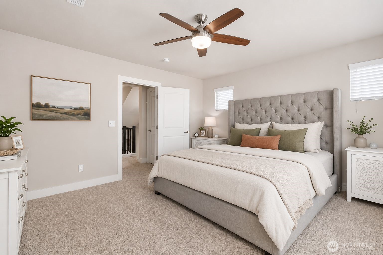 19607 25th Drive Southeast Bothell, WA 98012 - Photo 14 of 30 a spacious bedroom with a bed and a ceiling fan