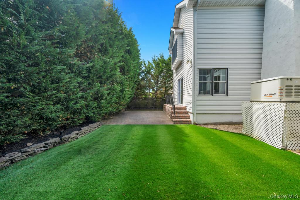 357 Wynsum Avenue Merrick, NY 11566 - Photo 39 of 40 a view of a back yard of the house