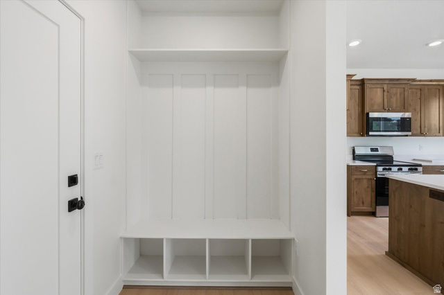 844 North 400 West Logan, UT 84321 - Photo 14 of 43 Built-in entryway storage with shelving and bench seating