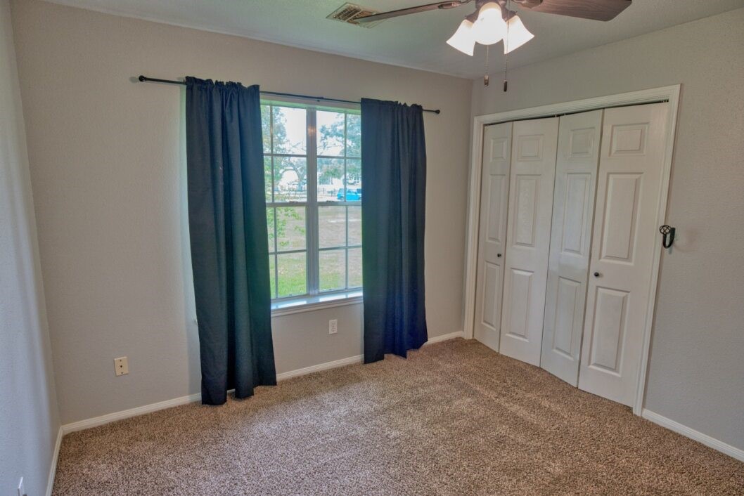 308 County Road 893B Angleton, TX 77515 - Photo 24 of 41 a view of an empty room with a window