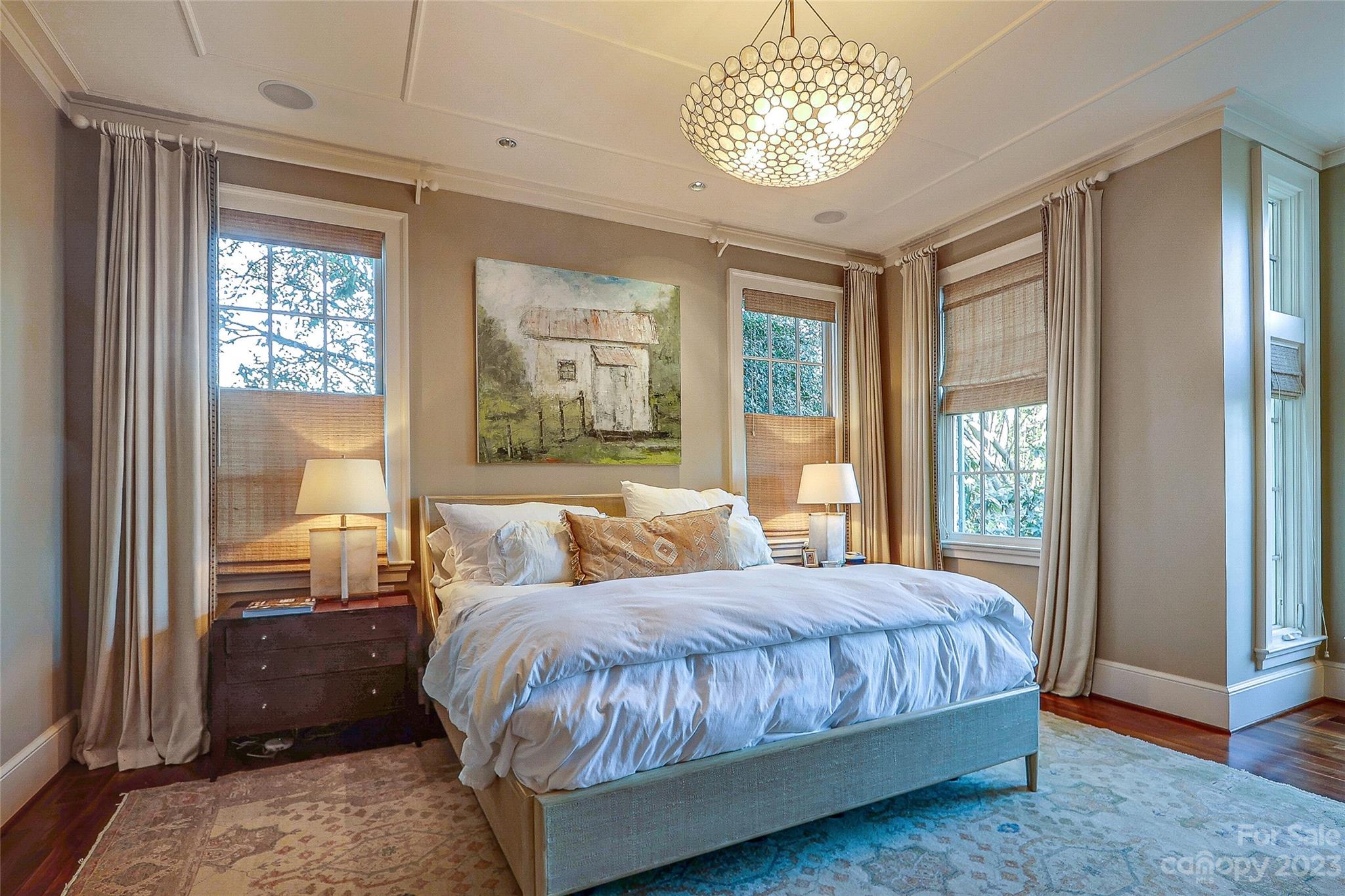 2237 Queens Road East Charlotte, NC 28207 - Photo 15 of 40 a bedroom with a large bed and a large window