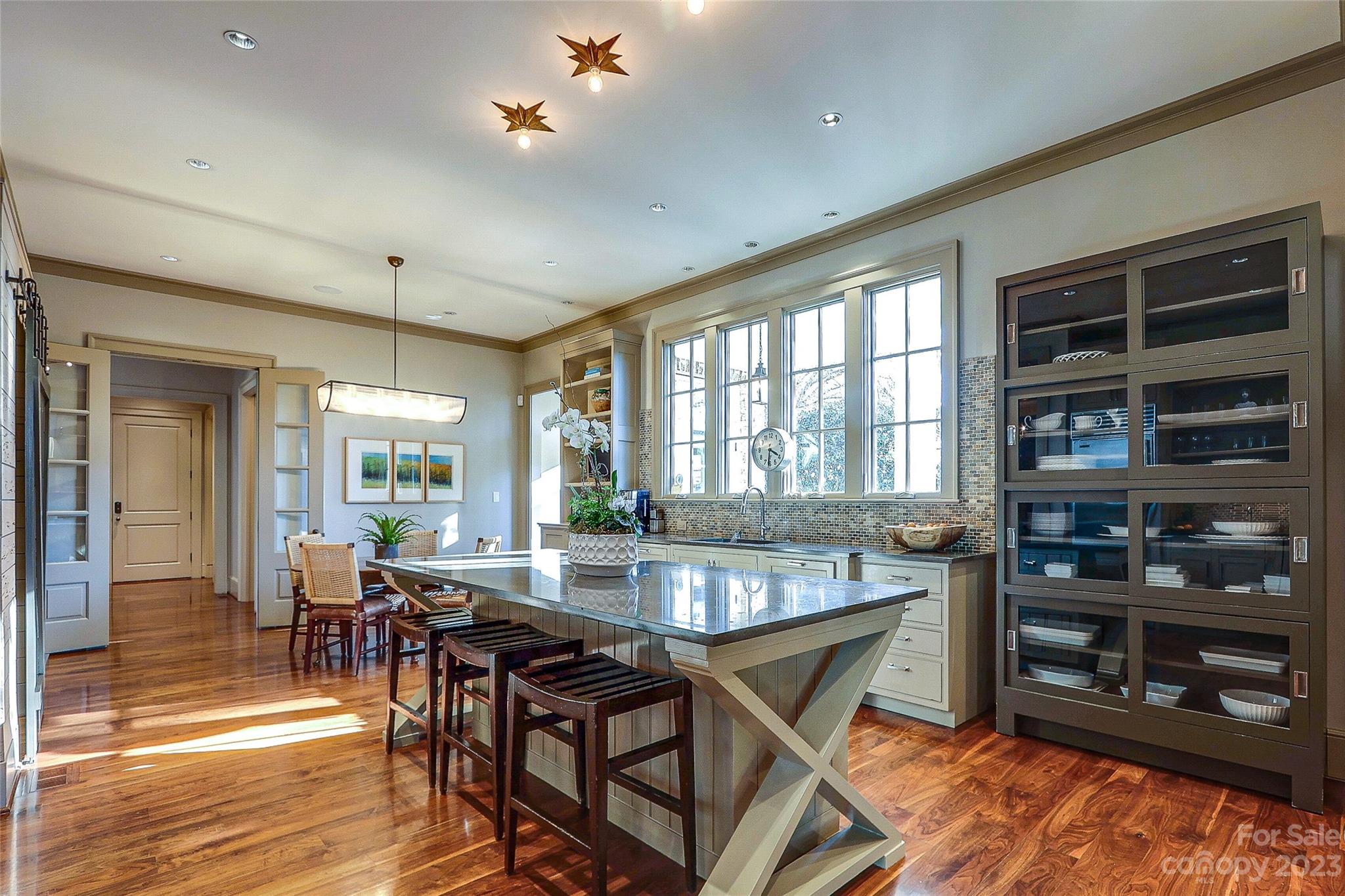 2237 Queens Road East Charlotte, NC 28207 - Photo 8 of 40 a view of a dining room with furniture window and wooden floor