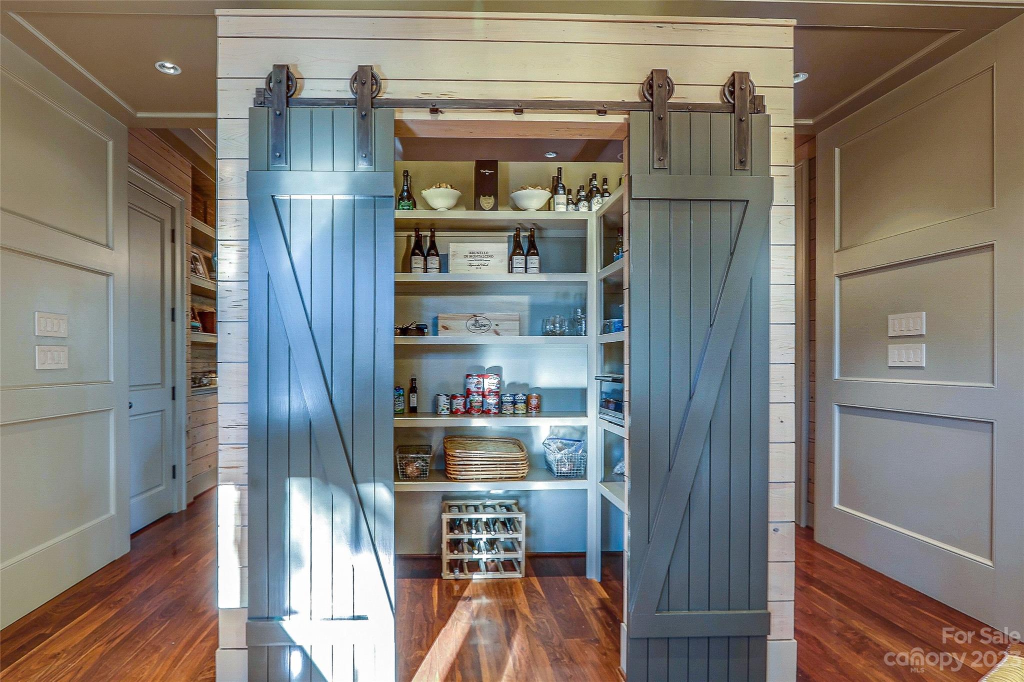 2237 Queens Road East Charlotte, NC 28207 - Photo 10 of 40 a kitchen with a refrigerator and wooden floor
