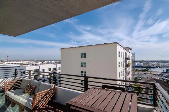 a backyard of a house with barbeque oven