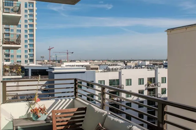 a view of a swimming pool with a building in the background