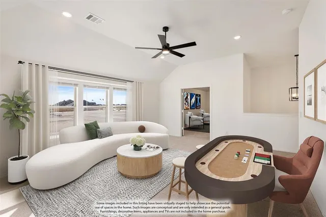 a living room with furniture and window