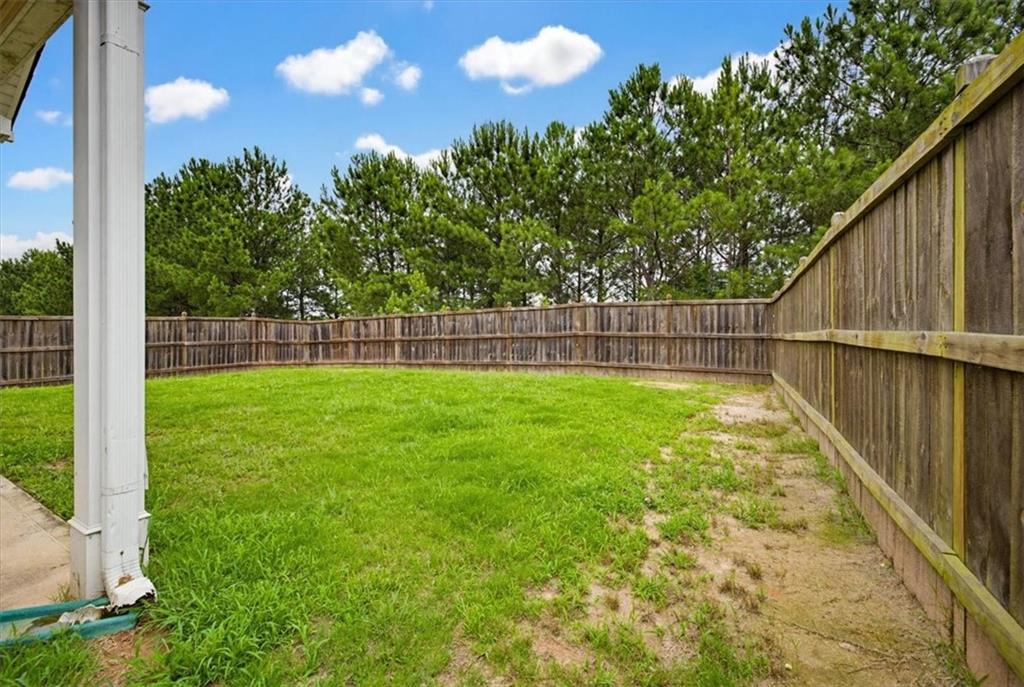 314 Boulder Run Hiram, GA 30141 - Photo 28 of 31 a view of yard with green space and wooden fence