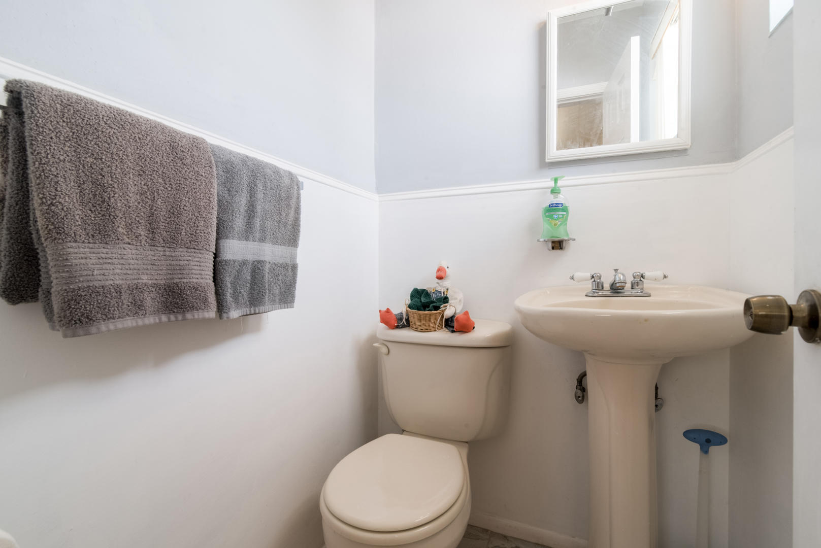 320 East Lake Road Palm Springs, FL 33461 - Photo 15 of 22 a bathroom with a sink a toilet and shower