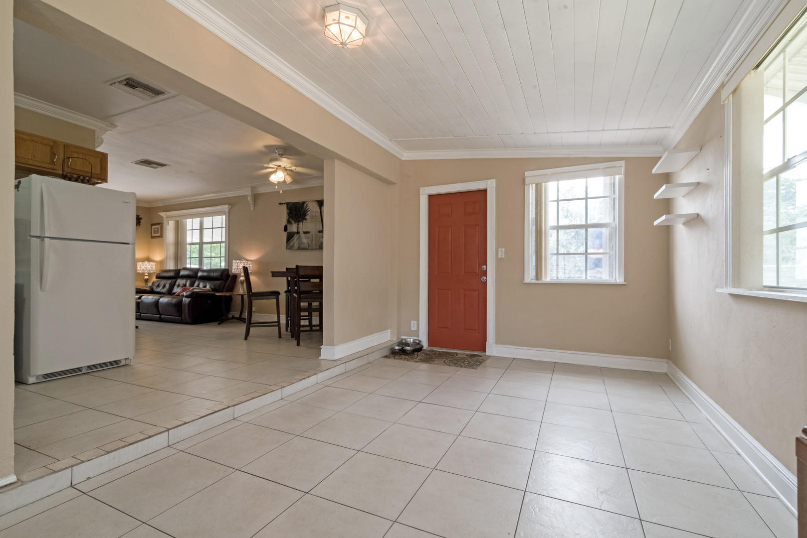 320 East Lake Road Palm Springs, FL 33461 - Photo 18 of 22 a view of a livingroom with furniture and windows