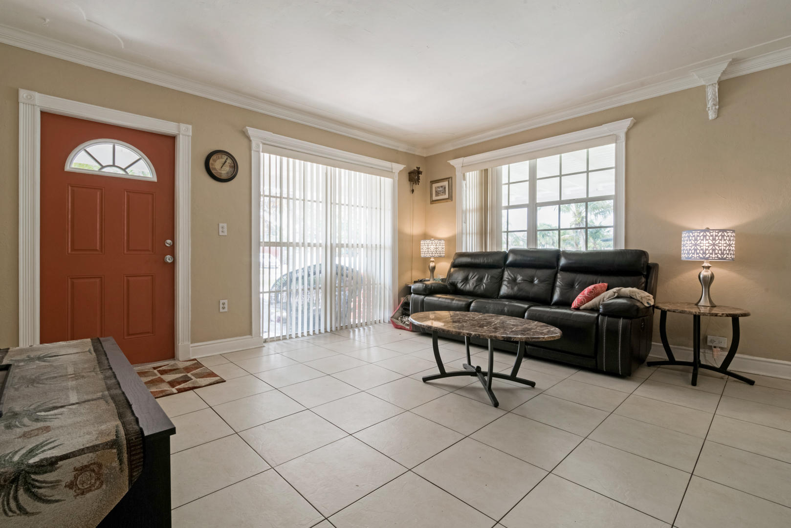 320 East Lake Road Palm Springs, FL 33461 - Photo 5 of 22 a living room with furniture and a window