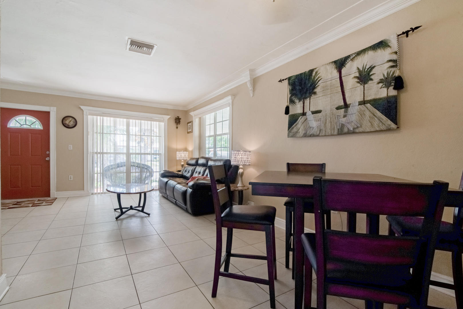 320 East Lake Road Palm Springs, FL 33461 - Photo 7 of 22 a living room with furniture and a window