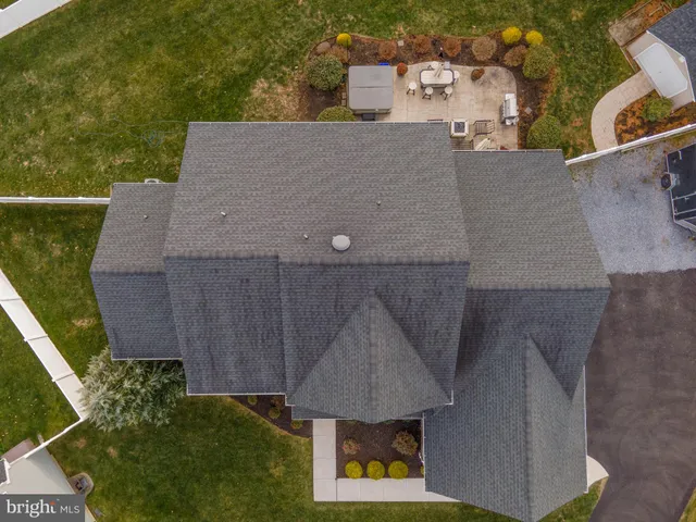 a view of an entryway with wooden floor and stairs