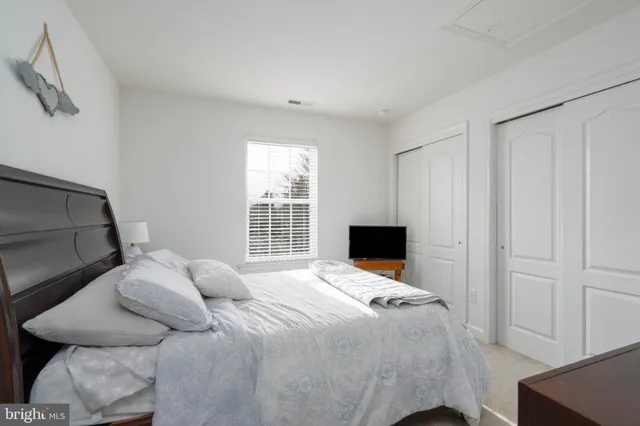 a view of a chairs and table in a room