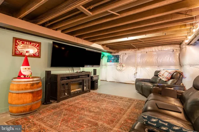 a view of a patio with table and chairs and potted plants
