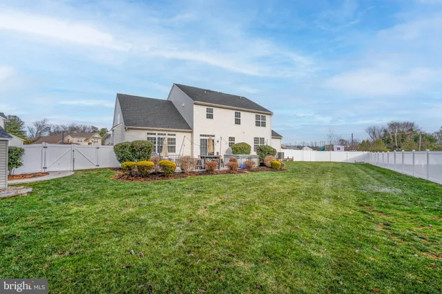 a front view of a house with garage