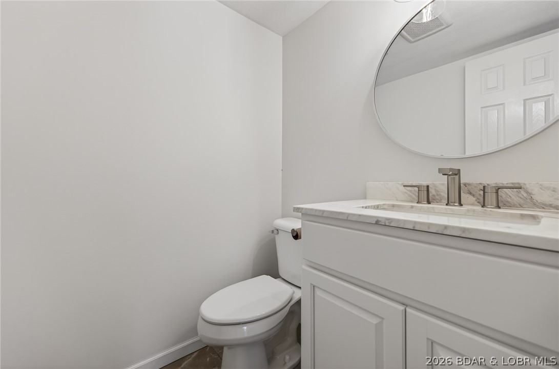 83 Ute Road Lake Ozark, MO 65049 - Photo 16 of 52 Lower level half bathroom