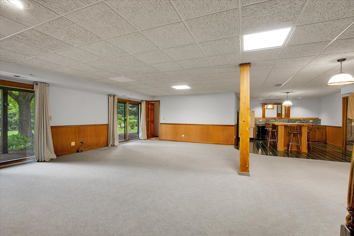 90 Briargate Road Cary, IL 60013 - Photo 26 of 42 a view of an empty room with a balcony