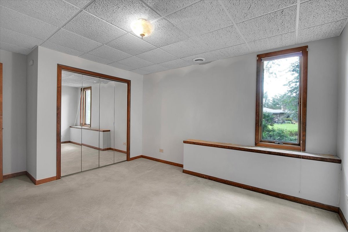 90 Briargate Road Cary, IL 60013 - Photo 32 of 42 an empty room with a window