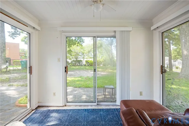 a room with furniture and a window
