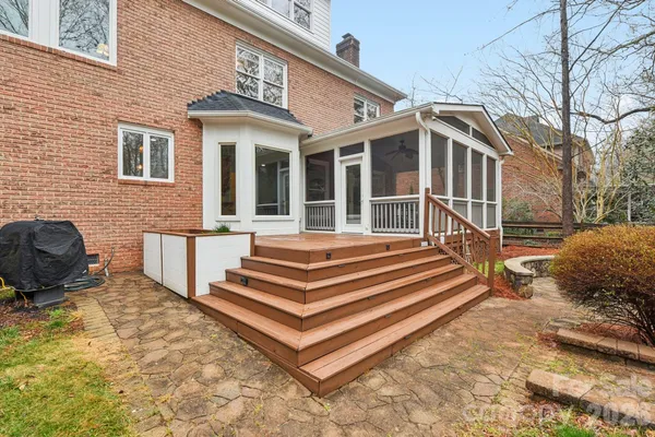 a view of a building with wooden floor and fence