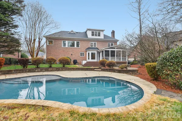 a view of a house with a swimming pool