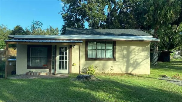 a view of a house with a garden